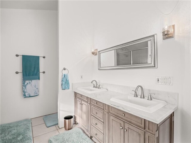 bathroom featuring vanity and tile patterned floors