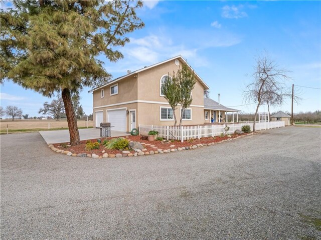 view of property exterior with a garage