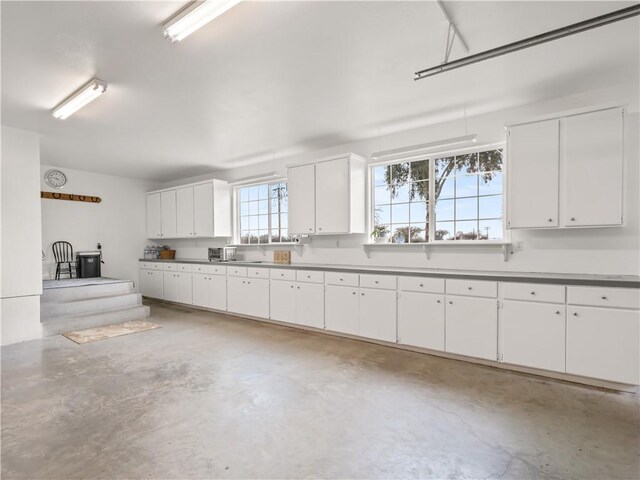 kitchen featuring white cabinets