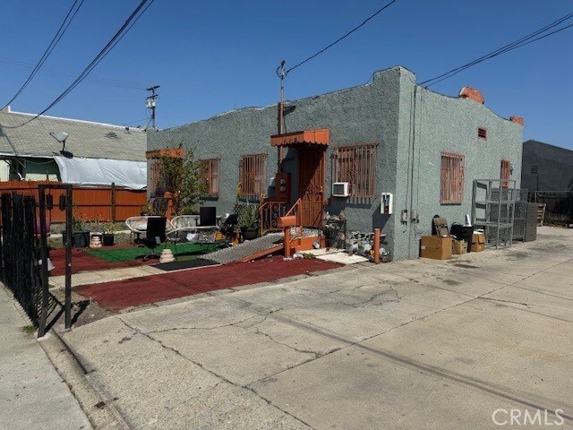 view of front of house with cooling unit