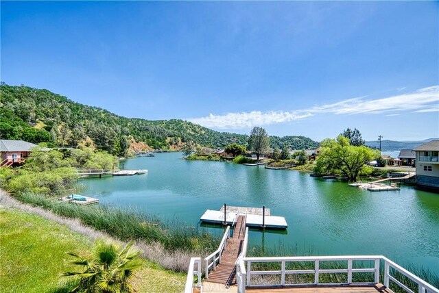 view of dock with a water view