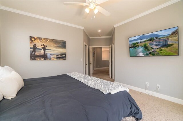 bedroom with crown molding, carpet floors, and ceiling fan