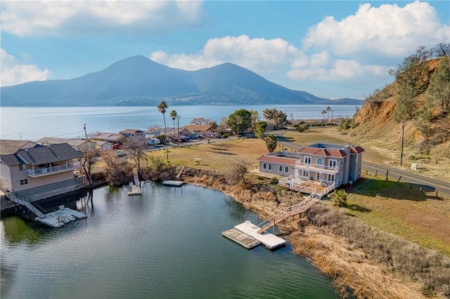 bird's eye view featuring a water and mountain view