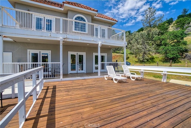 wooden terrace featuring french doors