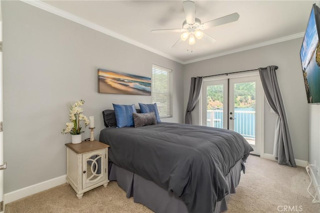 bedroom featuring access to exterior, ornamental molding, and light colored carpet