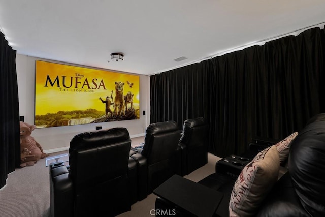 cinema with visible vents and carpet floors
