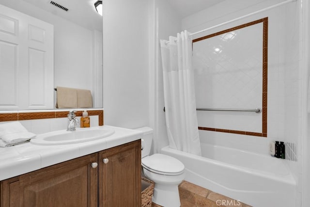 full bathroom with vanity, shower / bath combo, tasteful backsplash, and toilet