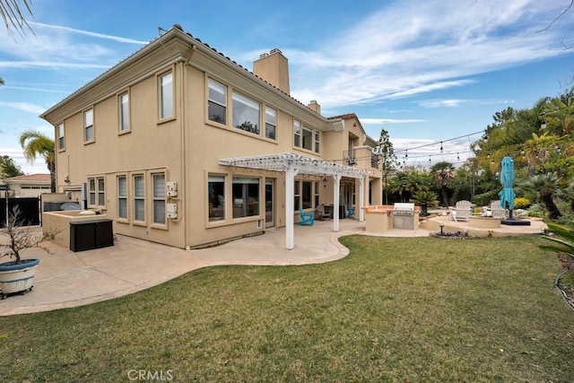 rear view of house featuring a patio area, area for grilling, an outdoor fire pit, a yard, and a pergola