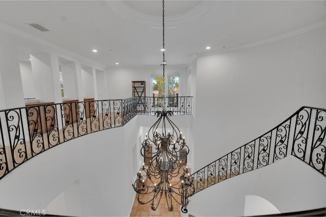 stairway featuring visible vents, a chandelier, recessed lighting, and crown molding