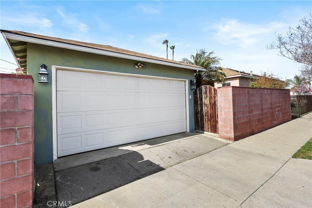 garage with fence