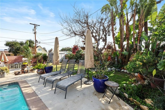 view of patio / terrace featuring an outdoor pool