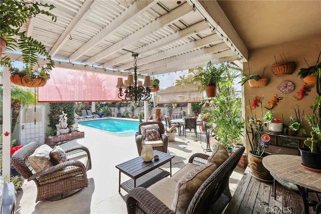 outdoor pool featuring an outdoor hangout area and a patio area