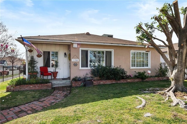 view of front of home with a front yard