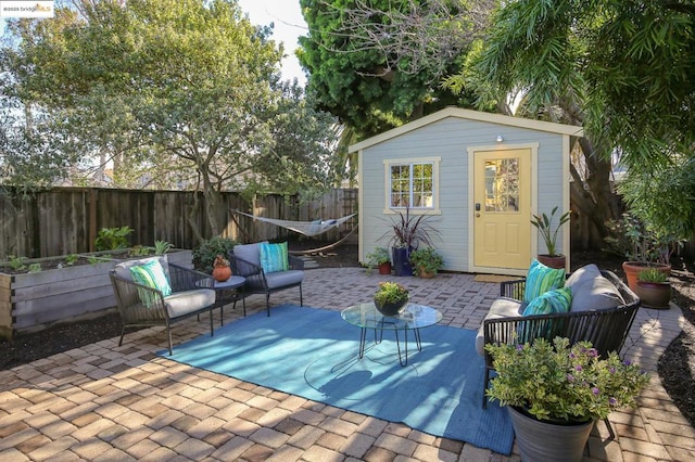 exterior space with an outbuilding and an outdoor living space