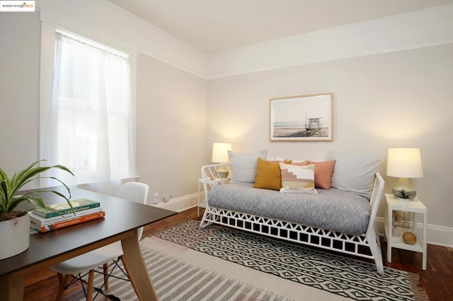 bedroom with hardwood / wood-style floors