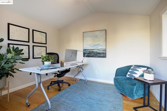 office area with lofted ceiling and wood-type flooring