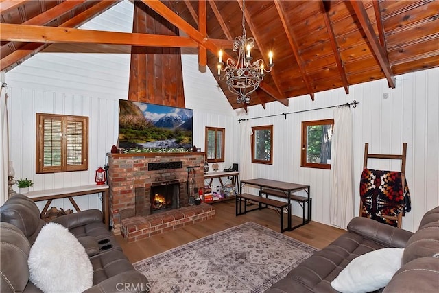 living room featuring a brick fireplace, vaulted ceiling with beams, hardwood / wood-style floors, and wood ceiling