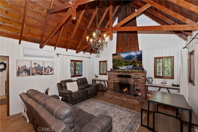 living room with plenty of natural light, wood-type flooring, a brick fireplace, wooden ceiling, and an AC wall unit