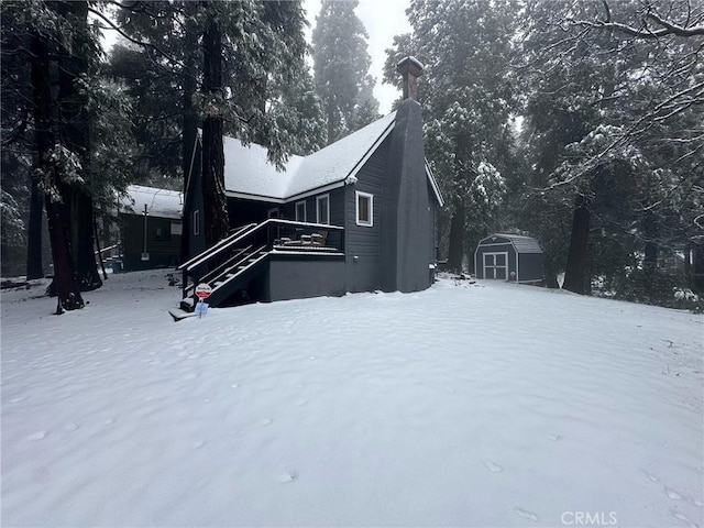 exterior space with a shed