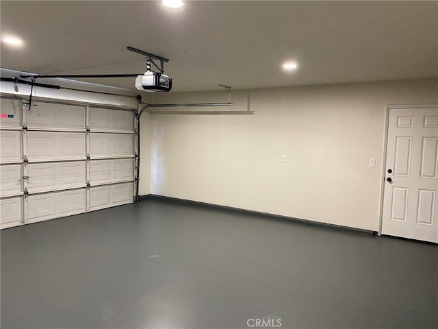 garage featuring a garage door opener