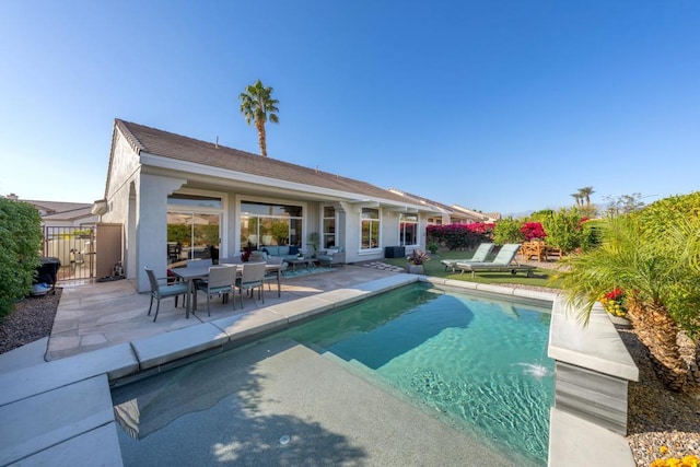 view of pool featuring a patio