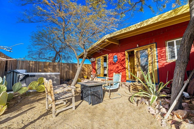 view of patio with a fire pit