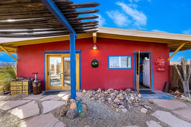 entrance to property with french doors