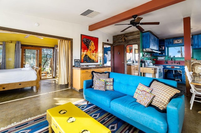 living room with beamed ceiling, sink, and ceiling fan