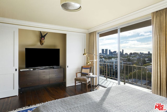 bedroom featuring ornamental molding, access to outside, and dark hardwood / wood-style flooring