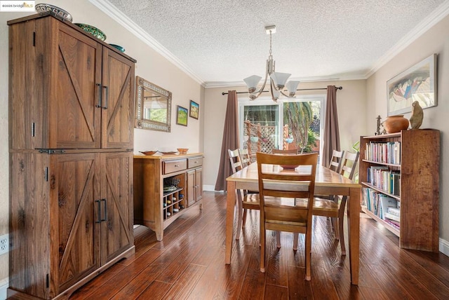 dining room featuring ornamental molding, dark hardwood / wood-style floors, a textured ceiling, and an inviting chandelier