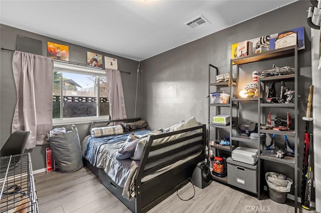 bedroom featuring light hardwood / wood-style flooring