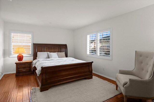 bedroom with light hardwood / wood-style floors