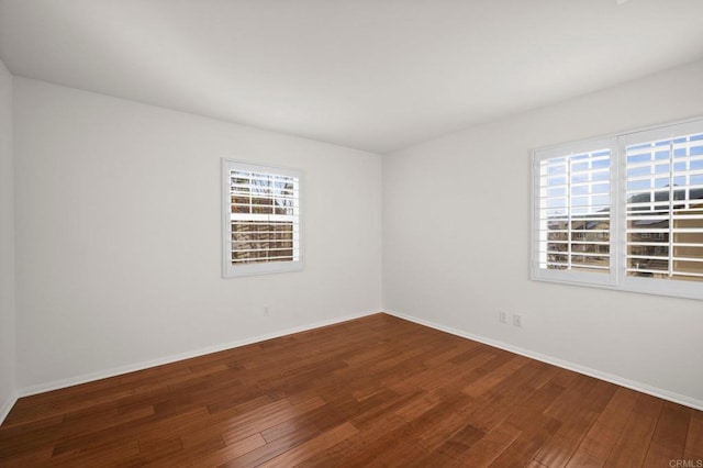 empty room featuring hardwood / wood-style floors