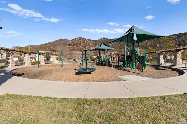 view of play area featuring a mountain view