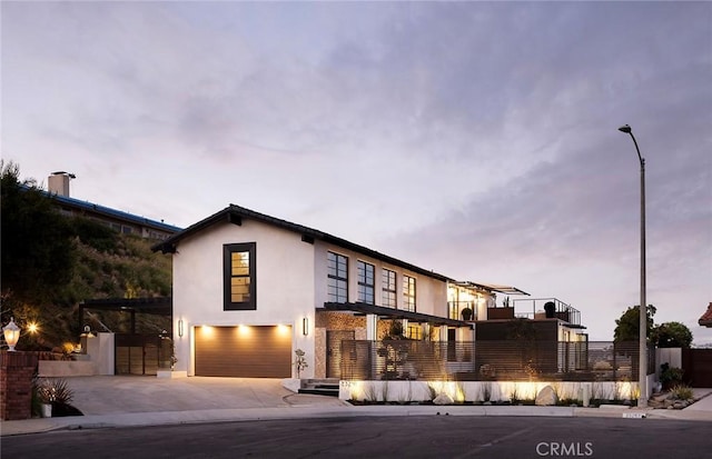 view of front of property with a garage