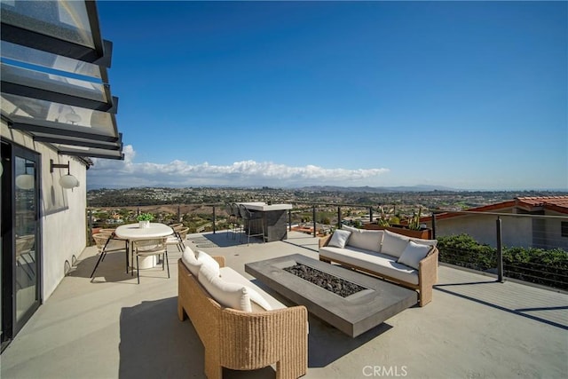 23241 Tasmania Cir, Dana Point, CA 92629 - view of patio / terrace with an outdoor living space with a fire pit