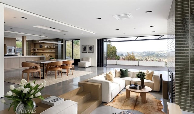23241 Tasmania Cir, Dana Point, CA 92629 - sunken living room with expansive windows and healthy amount of natural light