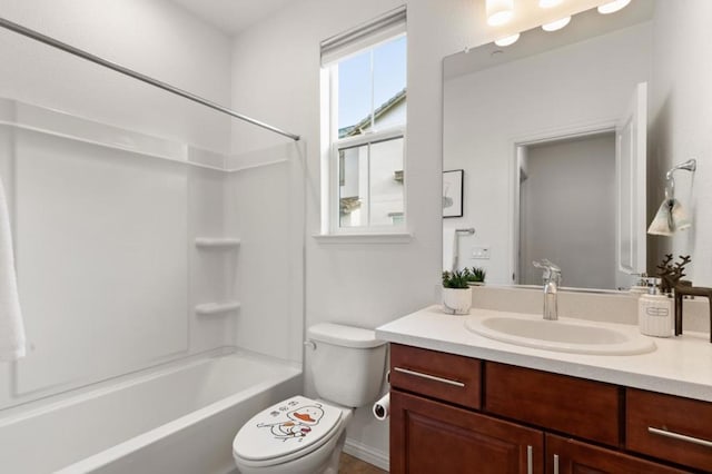 full bathroom featuring vanity, toilet, and bathing tub / shower combination