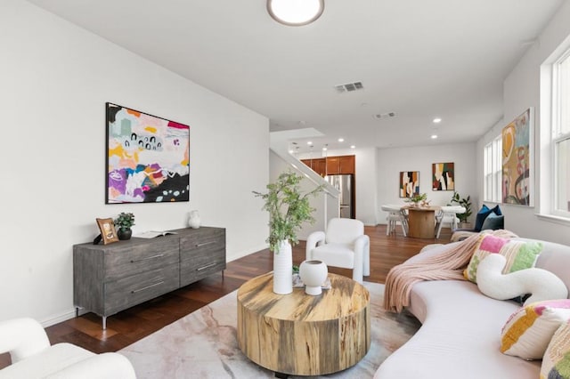 living room featuring dark hardwood / wood-style floors