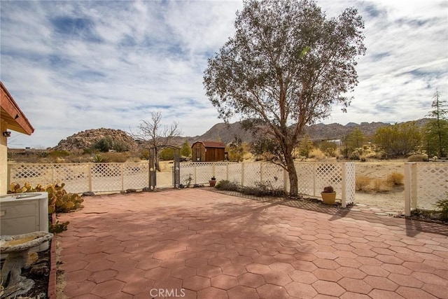 view of patio / terrace with a mountain view