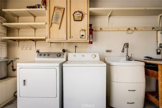 washroom with independent washer and dryer