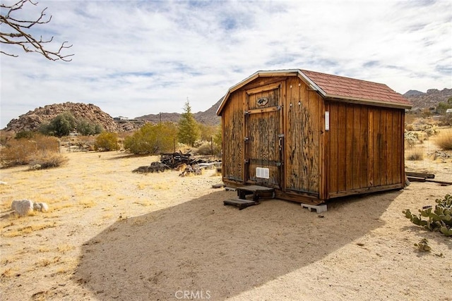 view of outdoor structure featuring a mountain view