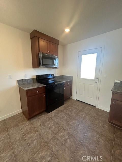 kitchen with black / electric stove