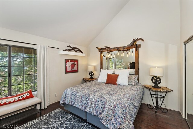 28050 State Highway 189 Unit 212, Lake Arrowhead, CA 92352 - bedroom with multiple windows, wood finished floors, and high vaulted ceiling