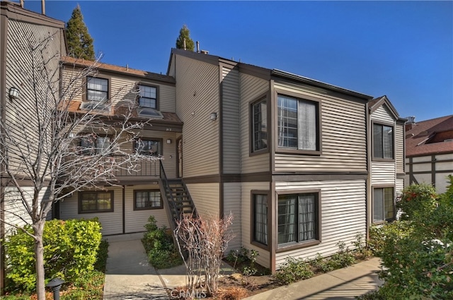 28050 State Highway 189 Unit 212, Lake Arrowhead, CA 92352 - view of building exterior featuring stairway