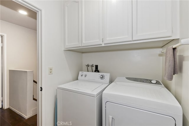 28050 State Highway 189 Unit 212, Lake Arrowhead, CA 92352 - laundry area with washer and clothes dryer, cabinet space, and dark wood finished floors