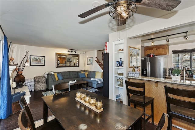 28050 State Highway 189 Unit 212, Lake Arrowhead, CA 92352 - dining room featuring ceiling fan and dark wood-type flooring