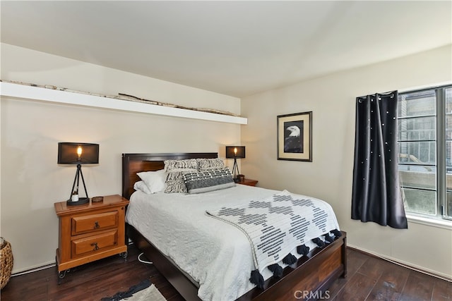 28050 State Highway 189 Unit 212, Lake Arrowhead, CA 92352 - bedroom with dark wood-style flooring