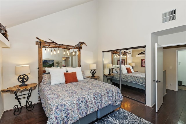 28050 State Highway 189 Unit 212, Lake Arrowhead, CA 92352 - bedroom with wood finished floors and a high ceiling