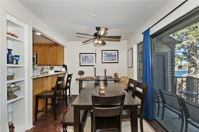 28050 State Highway 189 Unit 212, Lake Arrowhead, CA 92352 - dining area with dark wood-style floors and a ceiling fan